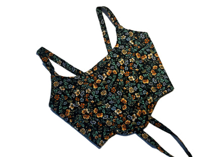 Wendbare Corsage aus schwarzer Baumwolle mit buntem Blumenmuster und schwarzer Rückseite – handmade, genderneutral, 2-in-1 Design
