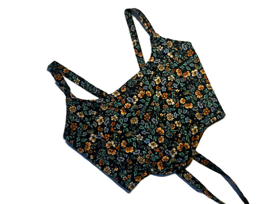 Wendbare Corsage aus schwarzer Baumwolle mit buntem Blumenmuster und schwarzer Rückseite – handmade, genderneutral, 2-in-1 Design
