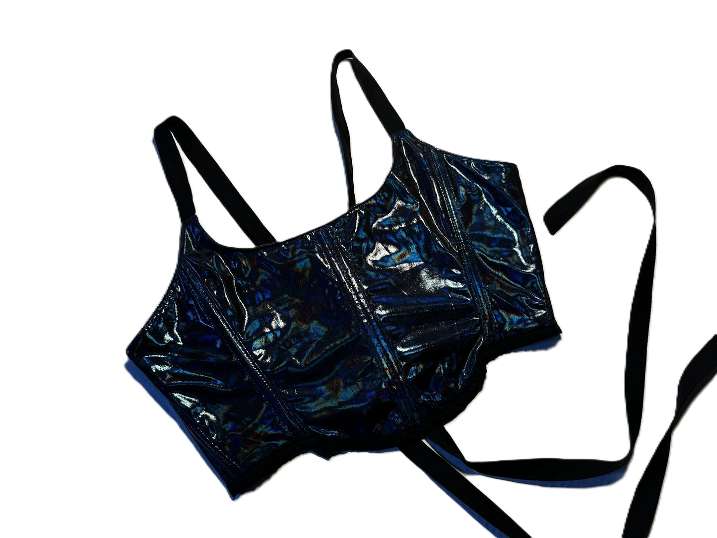 Reflektierende Upcycling-Corsage mit blau-grün schimmerndem Polyester, schwarzem Baumwollfutter und Baumwollträgern.